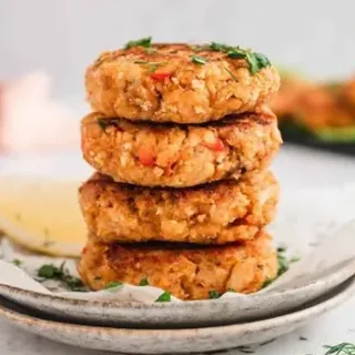A stack of golden salmon patties